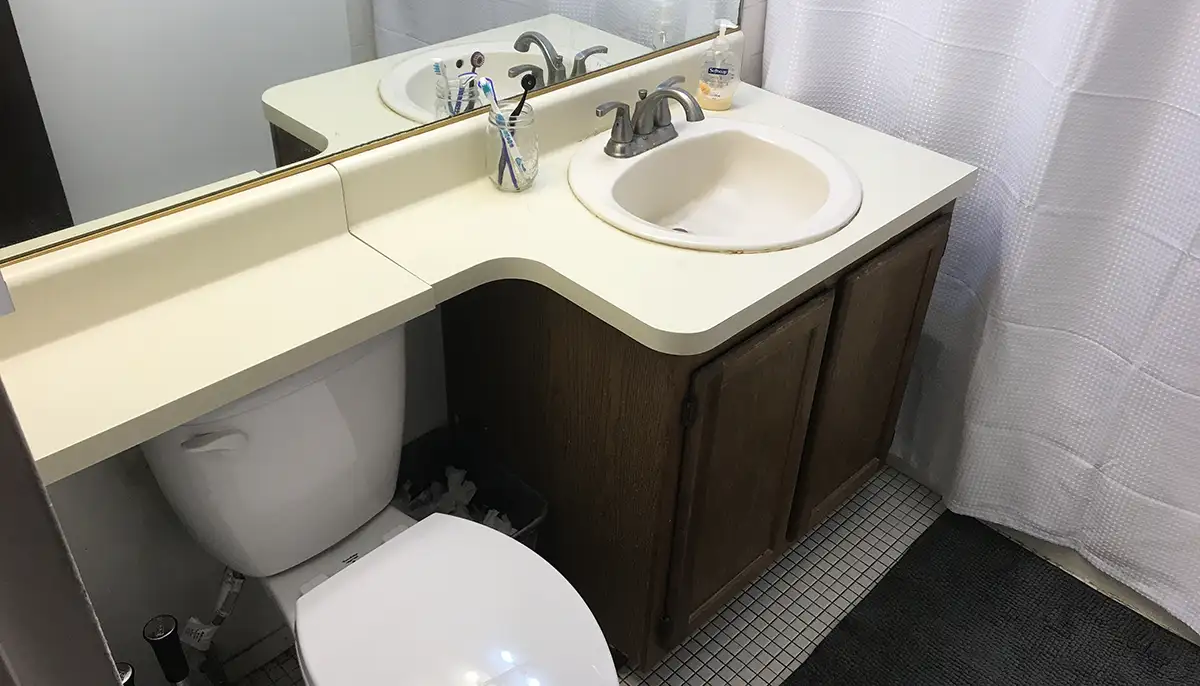 Old bathroom vanity before removal